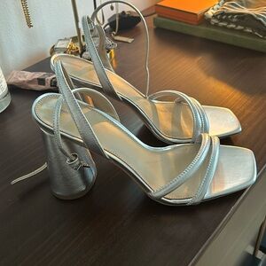Never been worn silver heels